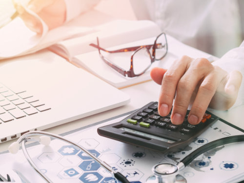 person using a calculator